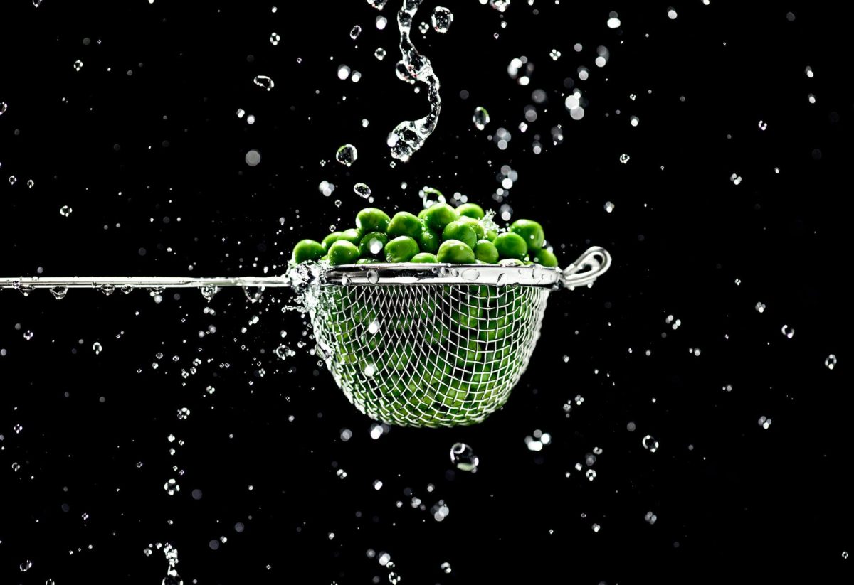 green fruits in strainer