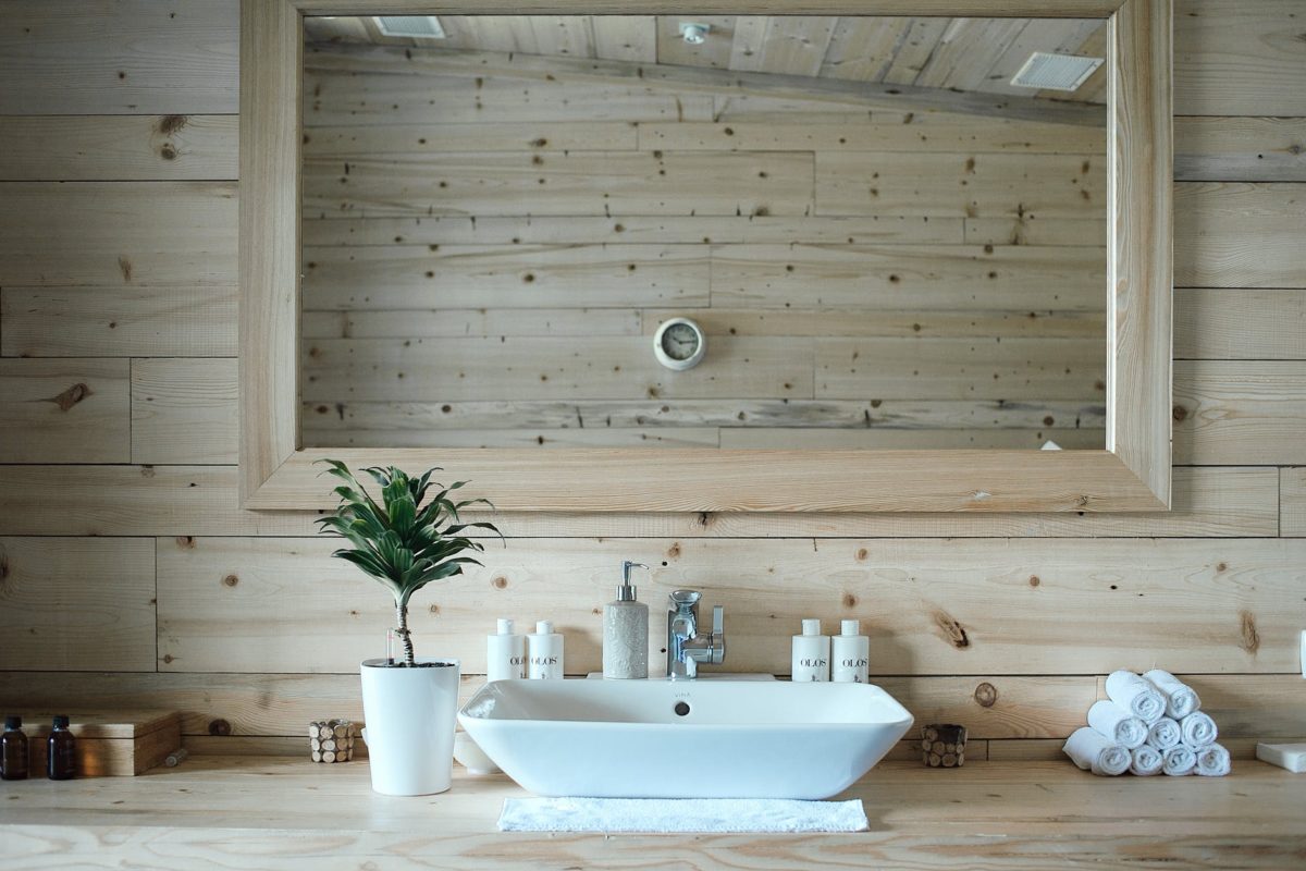 interior of modern stylish bathroom with wooden walls