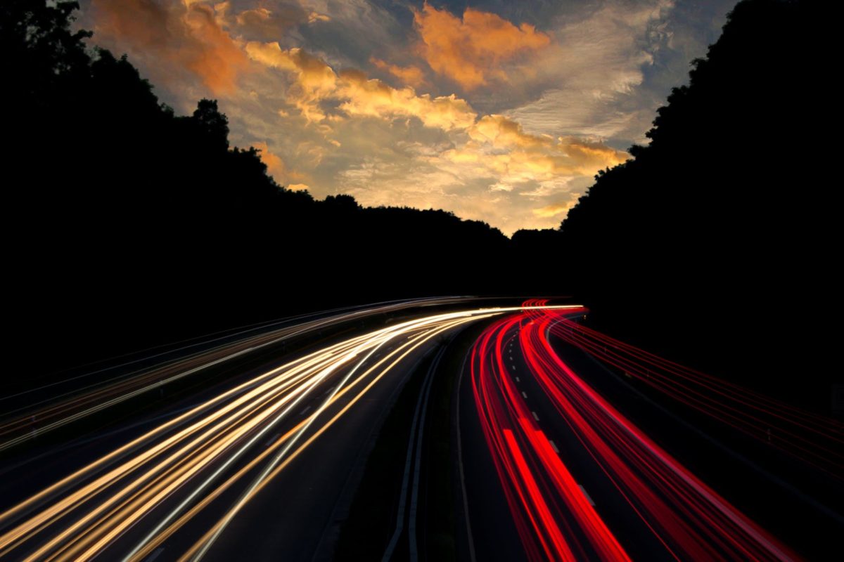 timelapse photography of road with white and red lights